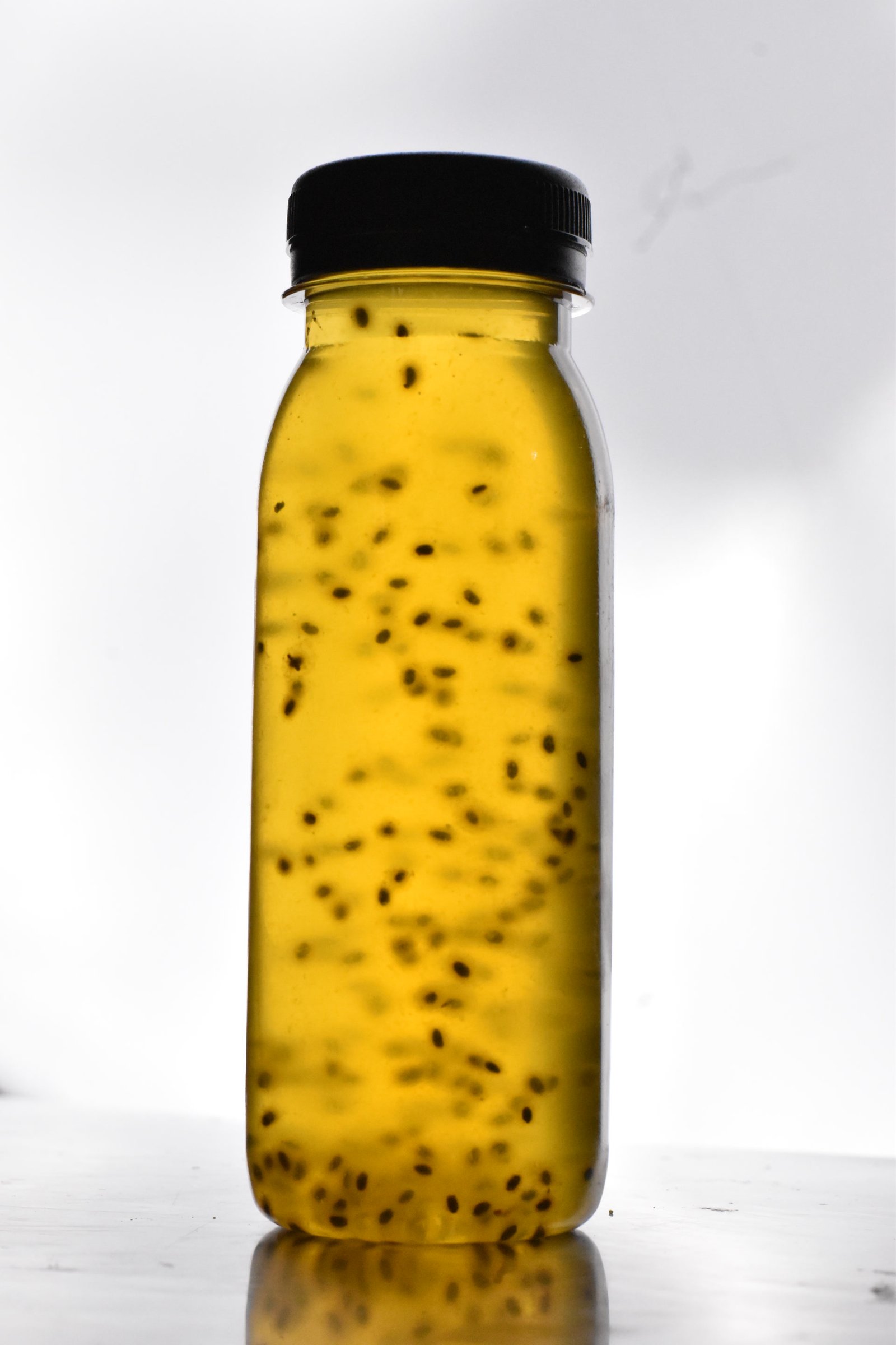 Bottled nannari sharbat with basil seeds